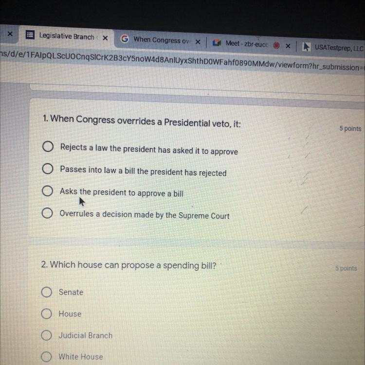 1. When Congress overrides a Presidential veto, it: Rejects a law the president has-example-1