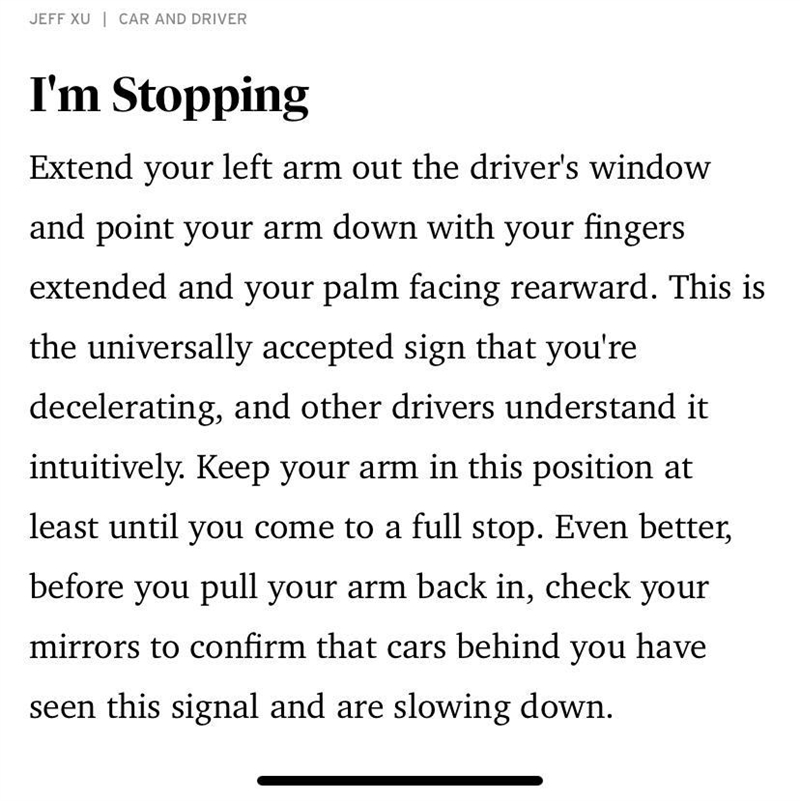 A driver is holding their left arm out the window and points the hand down, with the-example-1