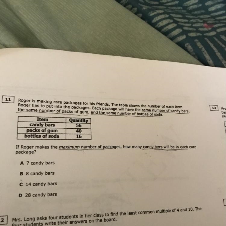 If Roger makes the maximum number of packages, how many candy bars will be in each-example-1