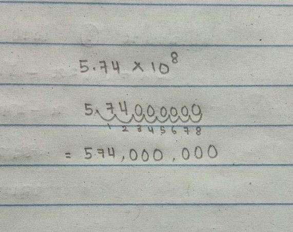 Convert to standard notation. 5.74 x 108-example-1