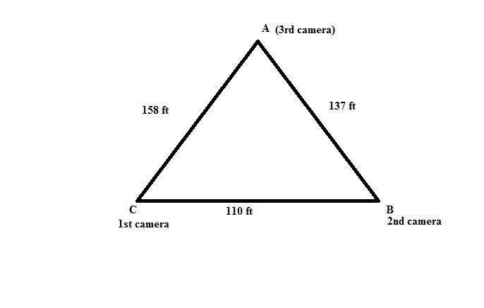 Three security cameras were mounted at the corners of a triangles parking lot. Camera-example-1