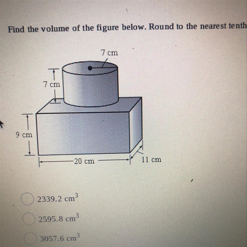 Find the volume of the figure below. Round to the nearest tenth. 7 cm 7 cm 9 cm 20 cm-example-1