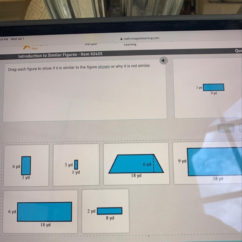 Drag each figure to show if it is similar to the figure shown or why it’s not similar-example-1