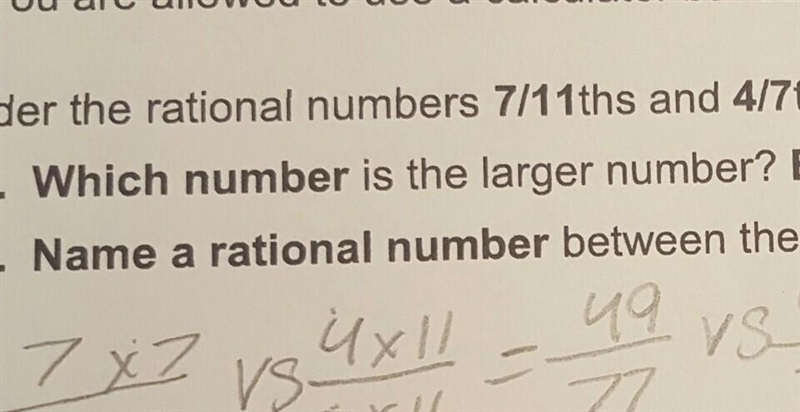 Name a rational number between the two given numbers? 7/11ths and 4/7ths explain how-example-1