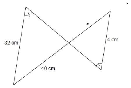 What is the value of x? Enter your answer in the box. x = cm A bow tie shape polygon-example-1