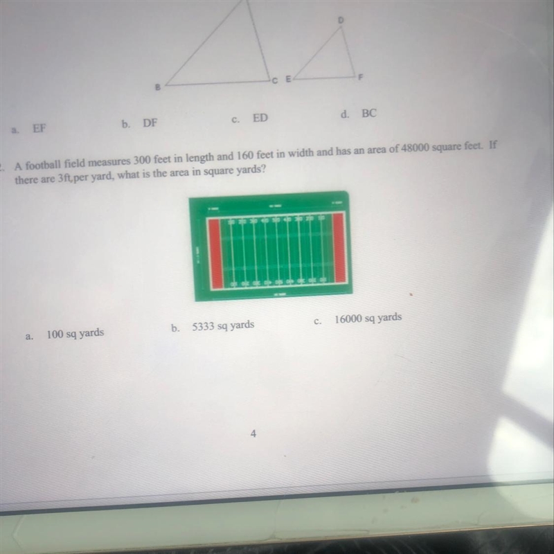 12. A football field measures 300 feet in length and 160 feet in width and has an-example-1