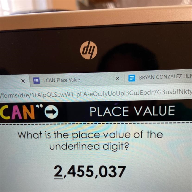 What is the place value of the underlined digit? 2,455,037-example-1