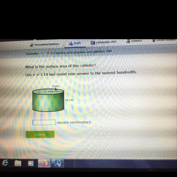 What is the surface area of this cylinder? Use 3.14 and round your answer to the nearest-example-1