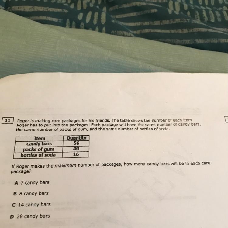 Roger is making care packages for his friends. The table shows the number of each-example-1