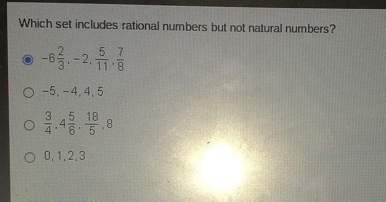 Which set includes rational numbers but not natural numbers? ​-example-1