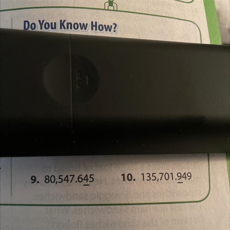 How do you round each number to the place value of the underlined digit?-example-1