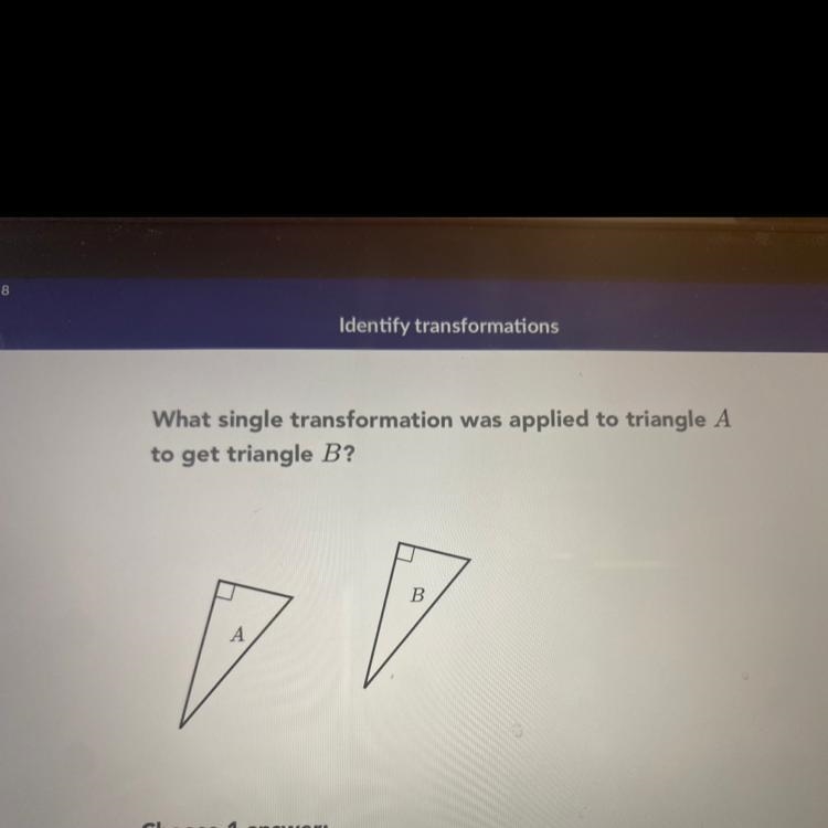 What single transformation was applied to triangle A to get triangle B? Answer: translation-example-1