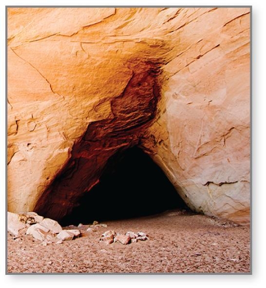 The triangle shaped entrance to the cavern i 1 1/2 feet tall and 4 feet wide whats-example-1