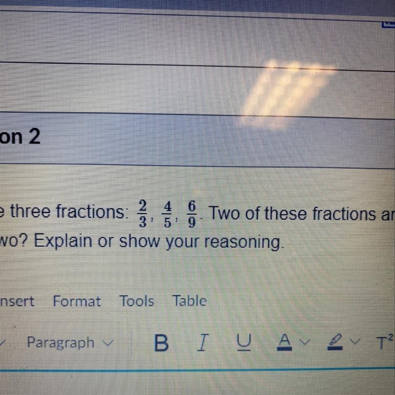 Here are three fractions: ſ . Two of these fractions are equivalent to each other-example-1