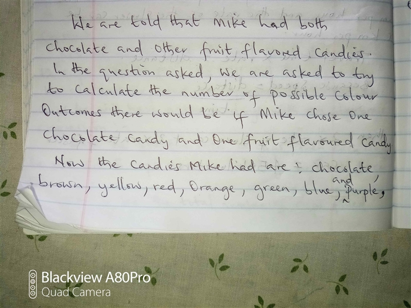 Mike had both chocolate: brown,yellow,red,orange,green,and blue Fruit flavored candy-example-1