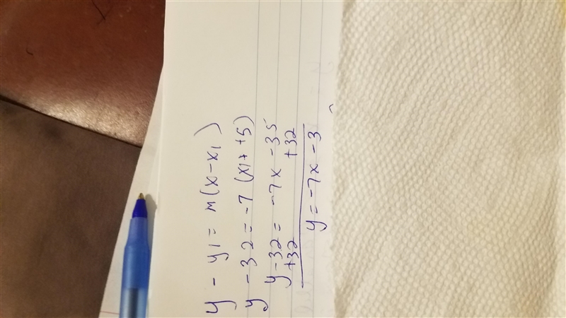 Find the equation of the line that is parallel to y = -7x + 2 and contains the point-example-1