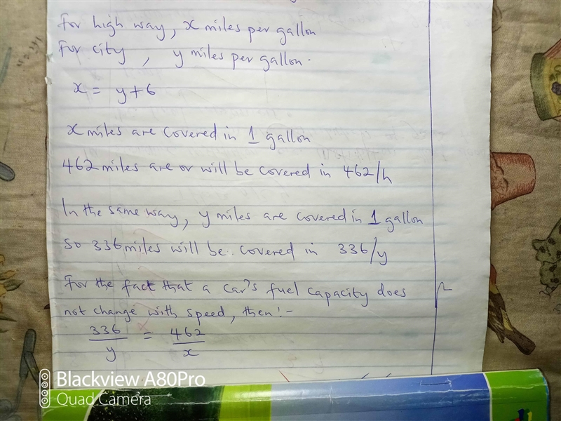 A car traveled 462 miles per tankful of gasoline on the highway and 336 miles per-example-1