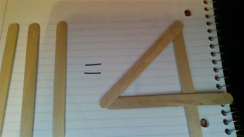 You are give 3 sticks .Make 4 out of them without breaking...how will do this?​-example-1