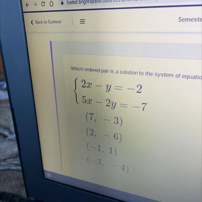 Which ordered pair is a solution to the system of equations?-example-1