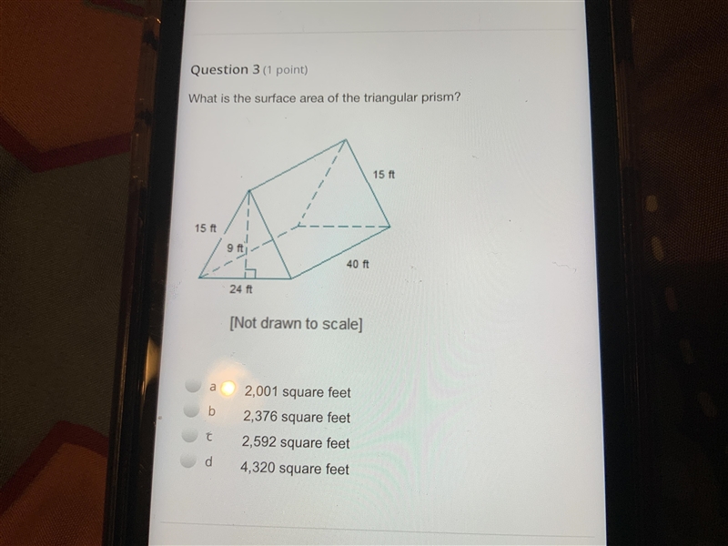 What is the surface area of the triangular prism Not drawn to scale 2001 2376 2592 4320-example-1