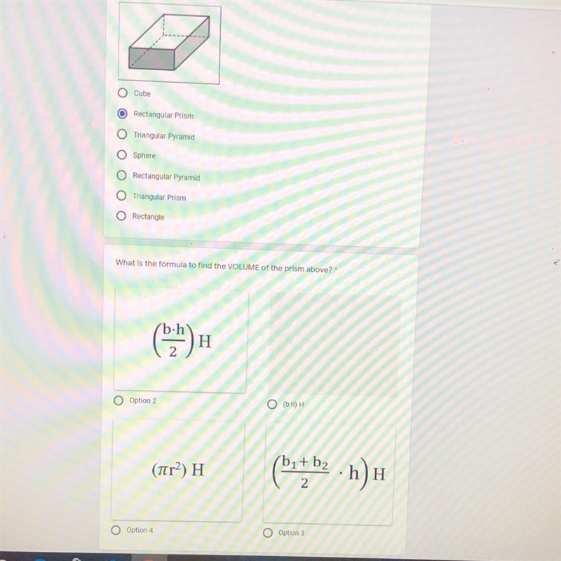 What is the formula to find the volume of the prism above?-example-1