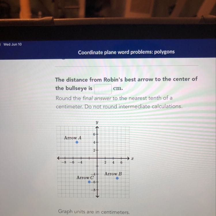 Robin is a competitive archer. Her average arrow is within 6.5 cm of the center of-example-1