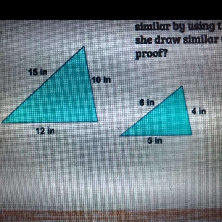 Are these two triangles similar? Explain your answer-example-1