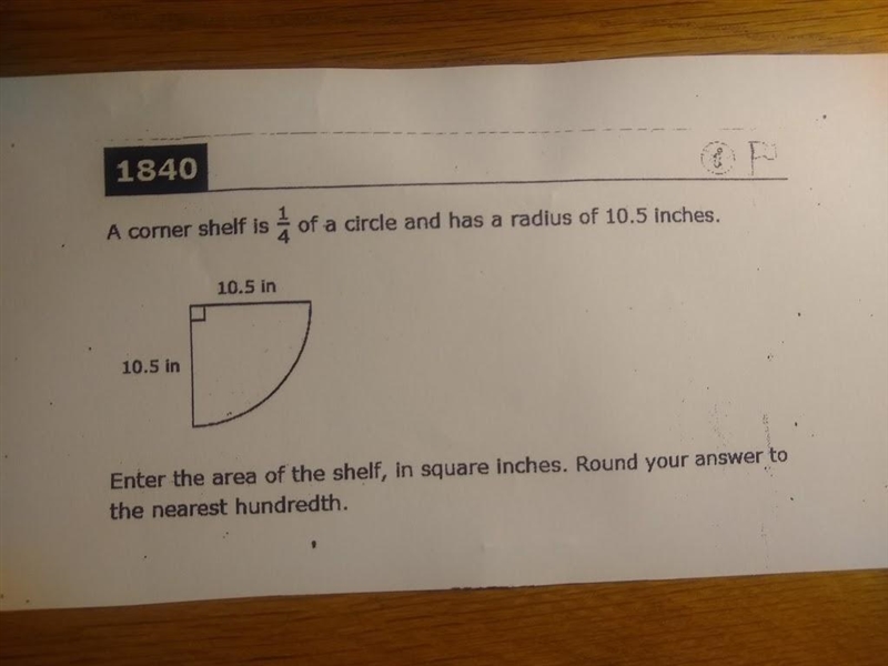 a corner self is 1/4 of a circle and has the radius of 10.5 inches. enter the area-example-1