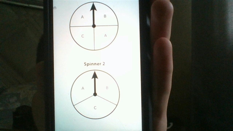 Two spinner are shown. Which best explains why one spinner is more likely to land-example-1