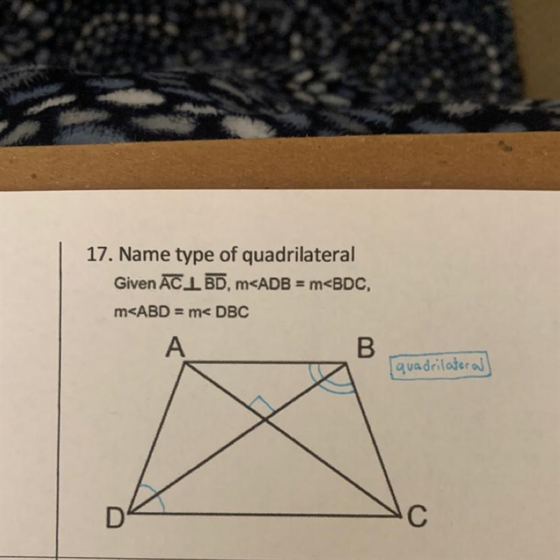 Name the type of quadrilateral in the photo-example-1