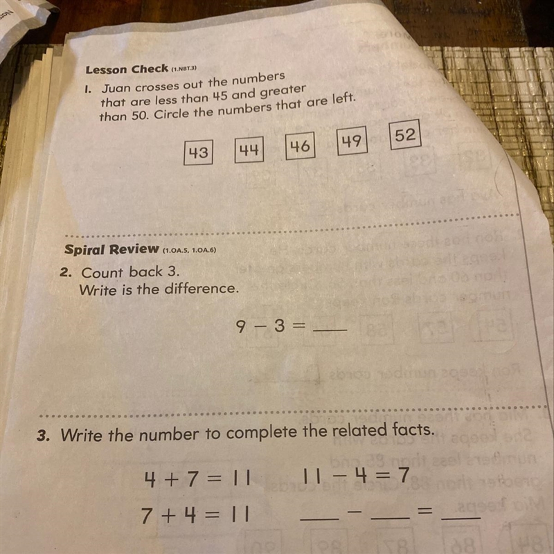 Juan crosses out the numbers that are less than 45 and greater than 50. Circle the-example-1