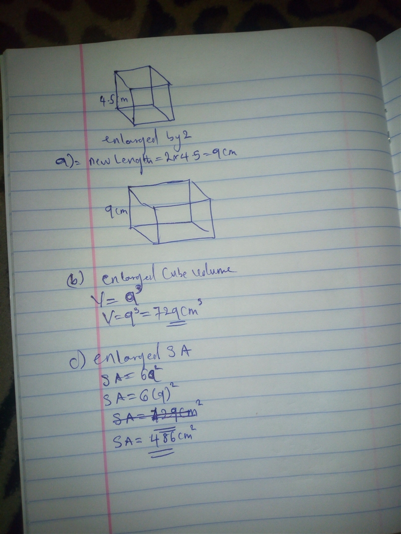 2. A cube has a side length of 4.5 cm. If this cube is enlarged by a scale factor-example-1