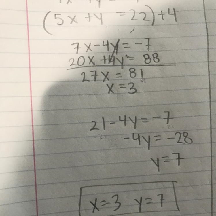 7x − 4y = −7 5x + y = 22-example-1