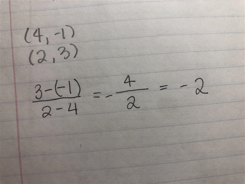 A line passes through the points (4, -1) and (2,3). What is the slope of the line-example-1