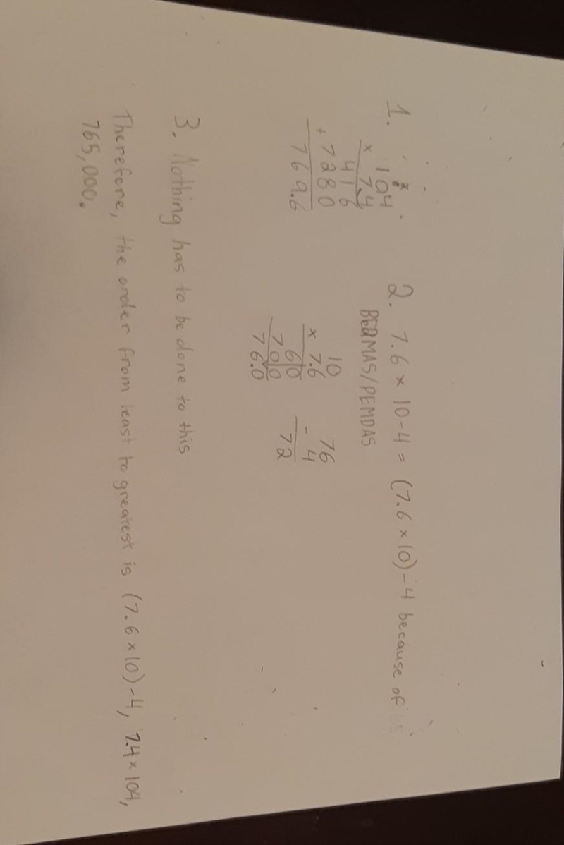 Order the numbers from least to greatest. 7.4 x 104 7.6 x 10-4 765,000-example-1