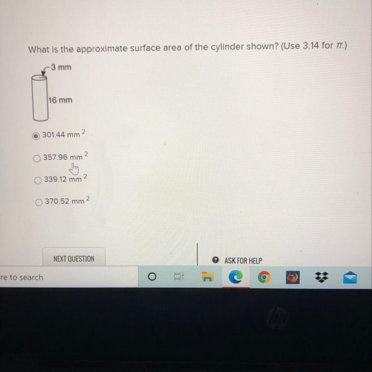 What is the approximate surface area of the cylinder shown? (Use 3.14 for TT.) -3 mm-example-1