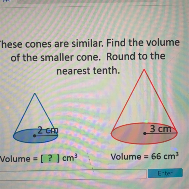 These cones are similar. Find the volume of the smaller cone. Round to the nearest-example-1