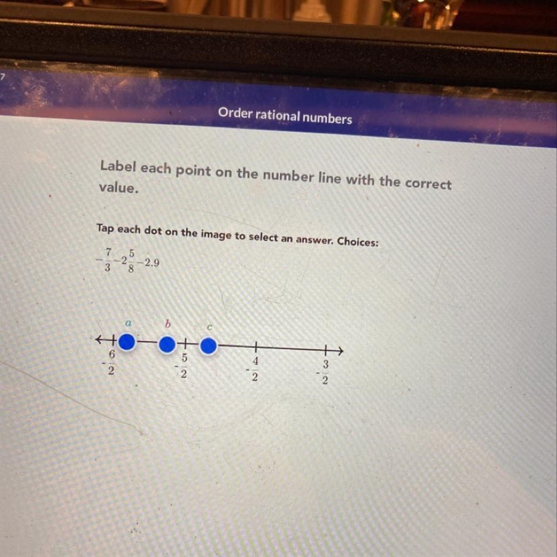 Label each pointon the number line with the correct value-example-1