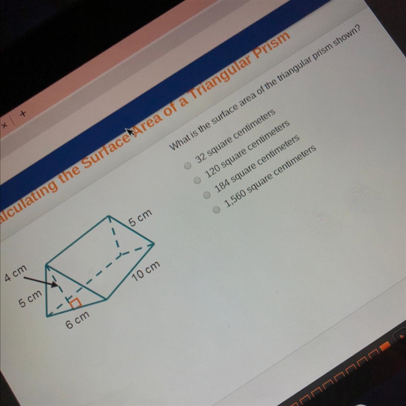 What is the surface area of the triangular prism shown-example-1