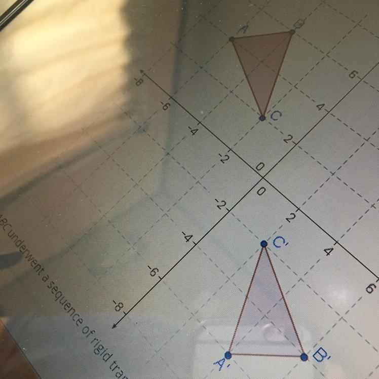 ABC underwent a sequence of rigid transformations to give ABC. Which transformations-example-1
