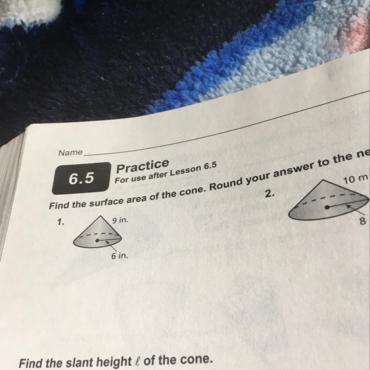 Find the surface area of the cone . Round your answer to the nearest tent-example-1