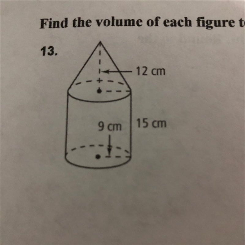 Find the volume to the nearest whole number-example-1