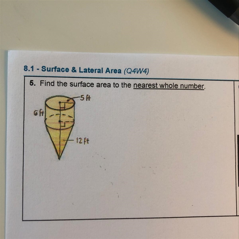 Find the surface area to the nearest whole number.-example-1