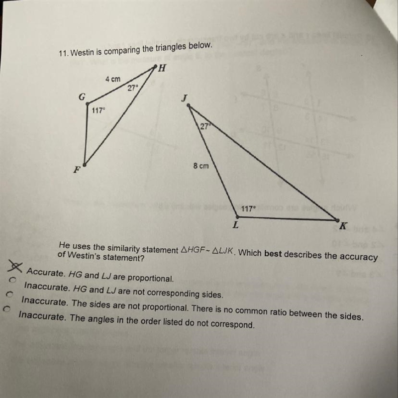 11. Westin is comparing the triangles below. The first one is not the answer help-example-1