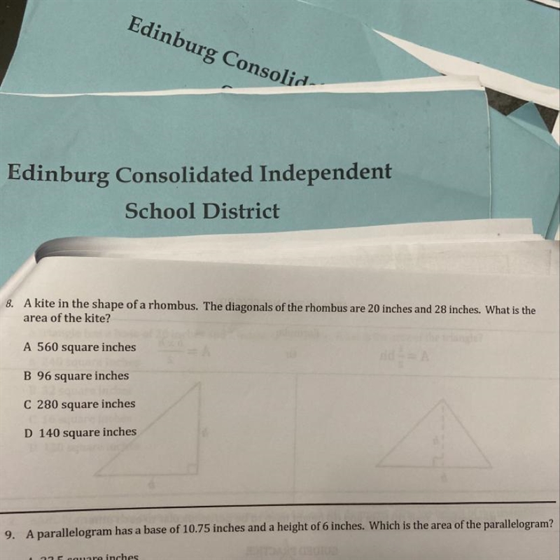 A. A kite in the shape of a rhombus. The diagonals of the rhombus are 20 inches and-example-1