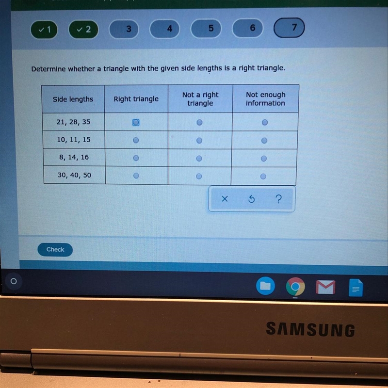 How do you tell if a triangle is a right triangle just from it’s measurements-example-1