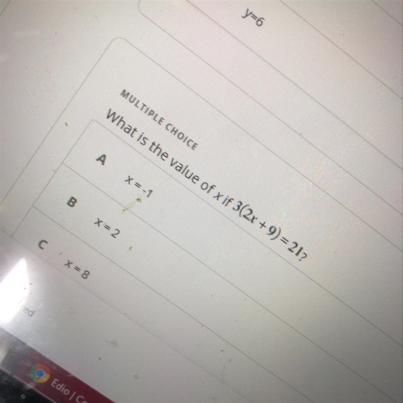 Value of x if 3(2x+9)=21?-example-1