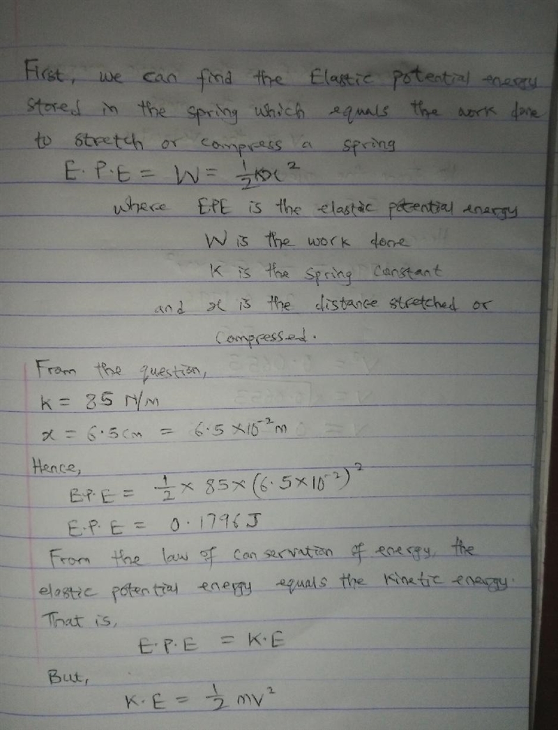 A horizontal spring with spring constant 85 N/m extends outward from a wall just above-example-1