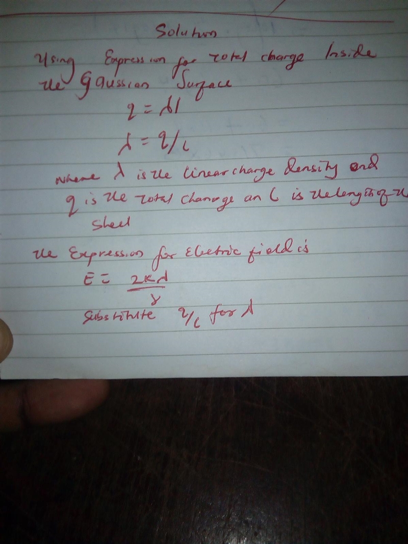 A cylindrical shell of radius 7.00 cm and length 2.21 m has its charge uniformly distributed-example-2