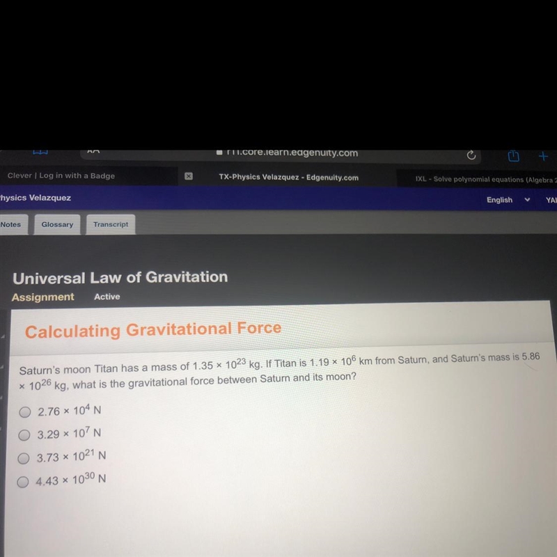 What is the gravitational force between Saturn and it’s moon-example-1